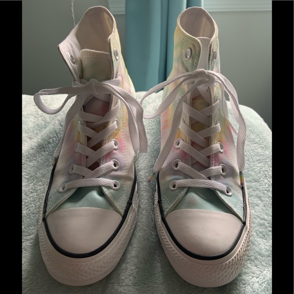 pastel pink converse high tops